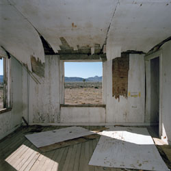 JEFF BROUWS - After Trinity, Nevada Test Site 20, remains of demolished house, photograph