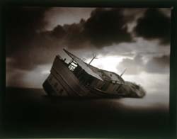 JAMES FEE - Night Freighter, Baja, Mexico, monochrome, sepia color, capsized boat, sinking ship