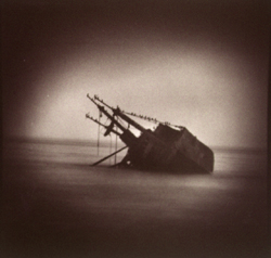 JAMES FEE - Night Freighter, Baja, Mexico, monochrome, sepia color, capsized boat, sinking ship