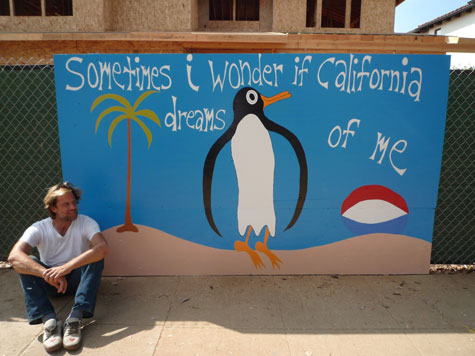 Michael Deyermond and one of his California murals