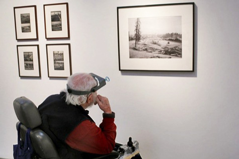 Richard C. Miller examining his work at Craig Krull Gallery