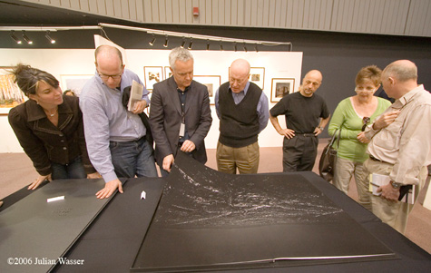 Craig Krull showing Michael Light's book to Mary and Dan Solomon, Weston Naef, and Marc Valesella at Photo LA, 2006