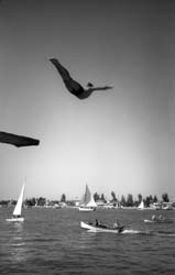 JULIUS SHULMAN - Self-Portrait diving into Newport Bay, c.1935